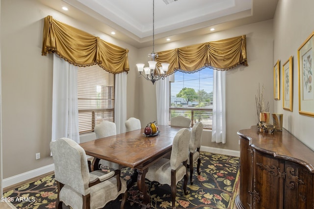 6861 W Calle Lejos, Peoria, AZ 85383 - dining area with a chandelier, recessed lighting, and a raised ceiling
