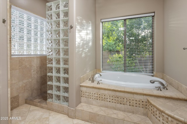 6861 W Calle Lejos, Peoria, AZ 85383 - bathroom with a garden tub, a walk in shower, plenty of natural light, and tile patterned floors