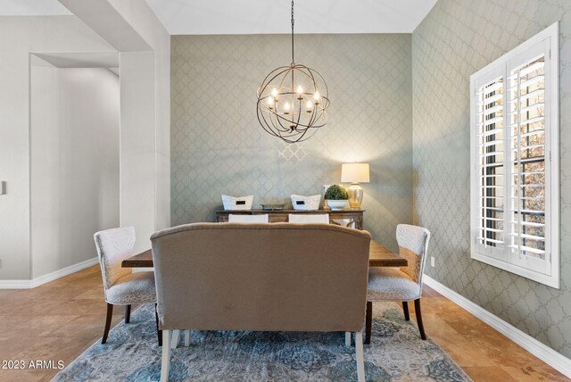 dining space with a notable chandelier