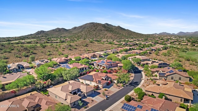 birds eye view of property featuring a mountain view