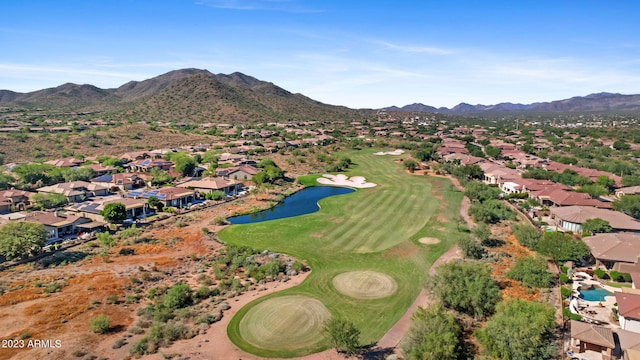 bird's eye view with a water and mountain view