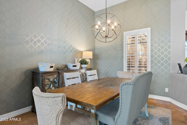 dining area featuring a chandelier and tile patterned floors