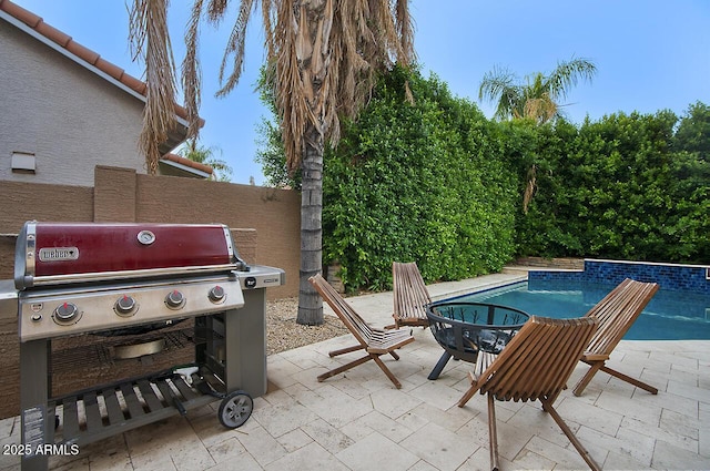 view of patio / terrace with an outdoor pool