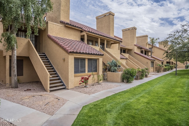 view of property featuring stairs