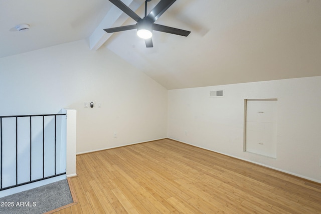 additional living space featuring lofted ceiling with beams, visible vents, a ceiling fan, and light wood finished floors