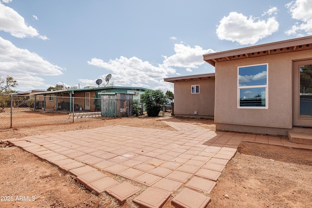 view of patio with fence