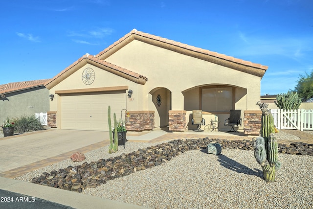 view of front of property with a garage