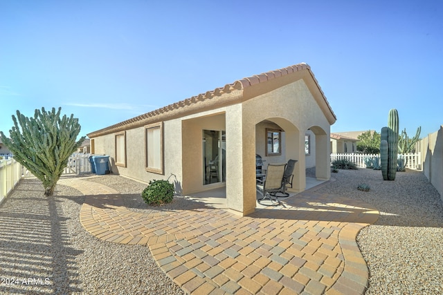 rear view of property with a patio