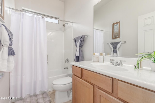 bathroom featuring shower / tub combo, vanity, and toilet