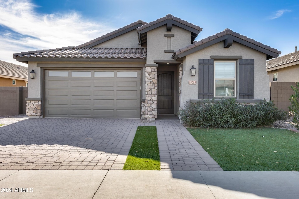 view of front of home with a garage