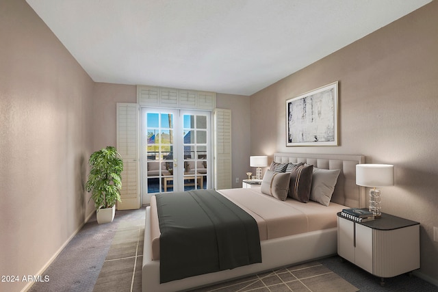 bedroom featuring french doors and dark carpet