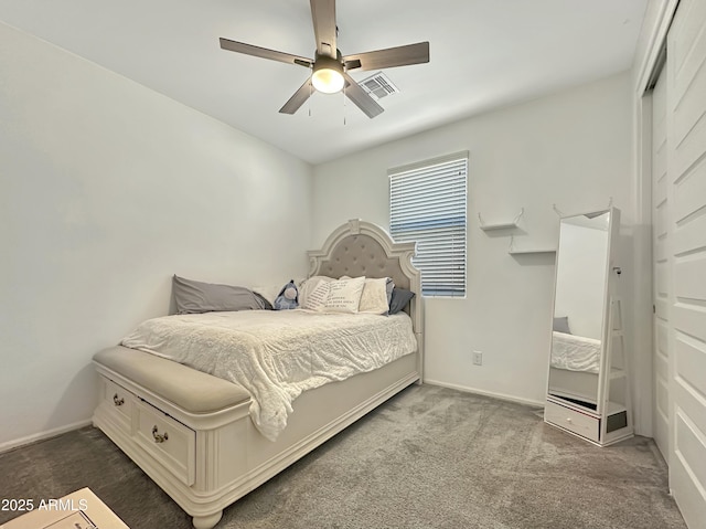 bedroom with visible vents, baseboards, carpet, and a ceiling fan