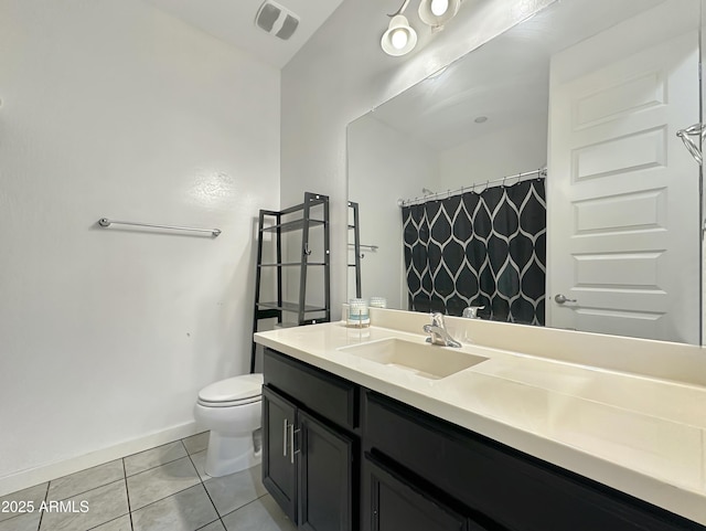 bathroom with visible vents, baseboards, toilet, tile patterned floors, and vanity