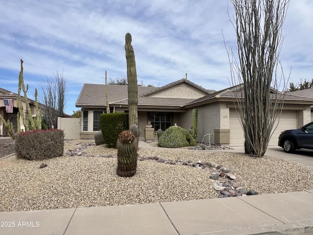 single story home featuring a garage