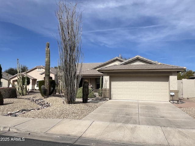 ranch-style house featuring a garage