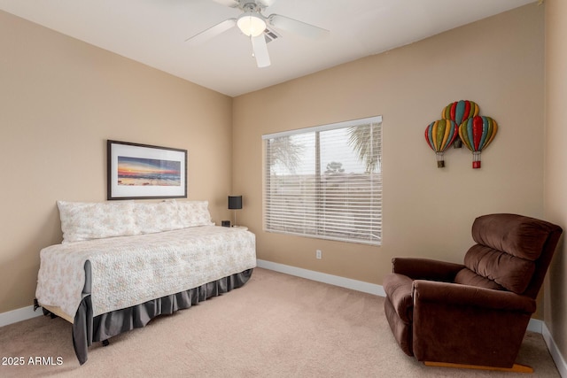 bedroom with baseboards, light carpet, and a ceiling fan