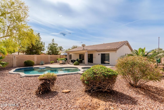 view of pool featuring a patio area, a fenced in pool, and a fenced backyard