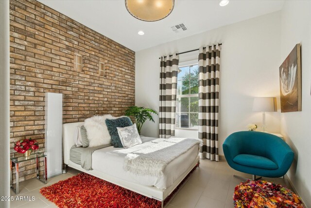 15711 S 11th Ave, Phoenix, AZ 85045 - tiled bedroom featuring brick wall and recessed lighting