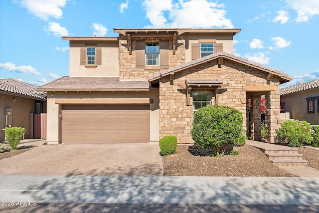 15711 S 11th Ave, Phoenix, AZ 85045 - view of front of property with stone siding, a garage, driveway, and stucco siding