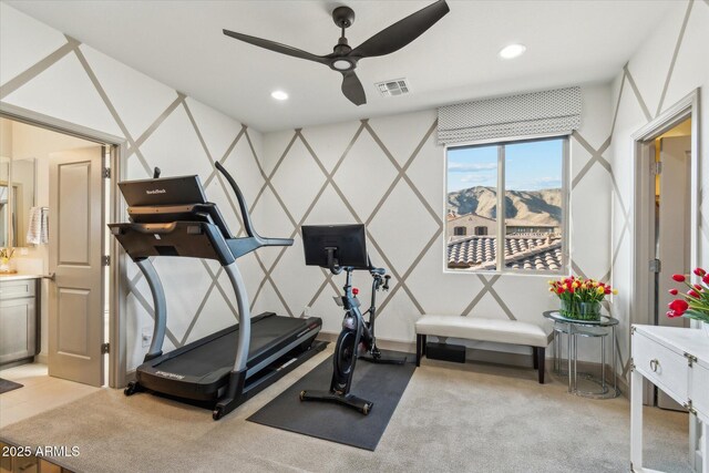 15711 S 11th Ave, Phoenix, AZ 85045 - workout area featuring ceiling fan, recessed lighting, a mountain view, and light carpet