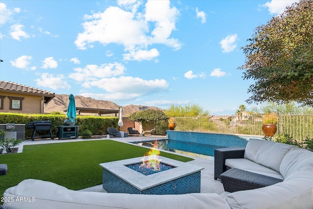 15711 S 11th Ave, Phoenix, AZ 85045 - view of pool with an outdoor living space with a fire pit, a patio area, and area for grilling