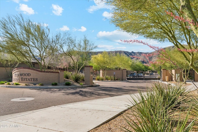 15711 S 11th Ave, Phoenix, AZ 85045 - community sign with a mountain view and a gate