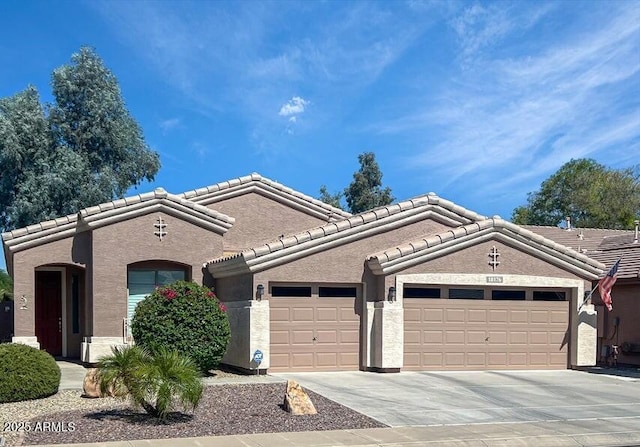 view of front of property with a garage