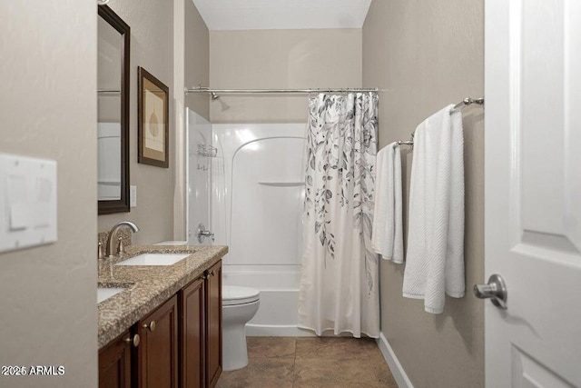 full bathroom with shower / tub combo, vanity, and toilet