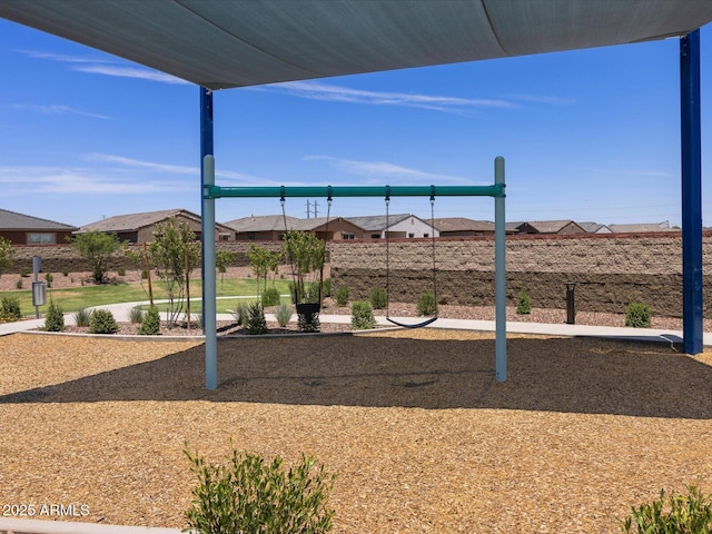 view of playground with a residential view