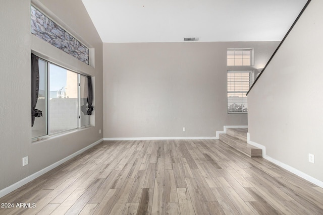 unfurnished living room featuring light wood-type flooring