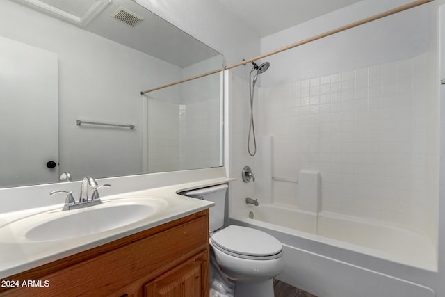 full bathroom featuring vanity, shower / bath combination, and toilet