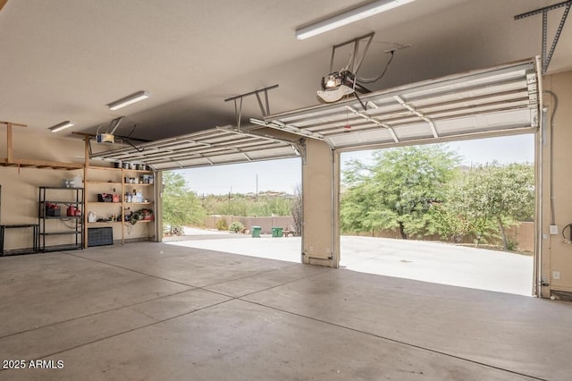 garage featuring a garage door opener