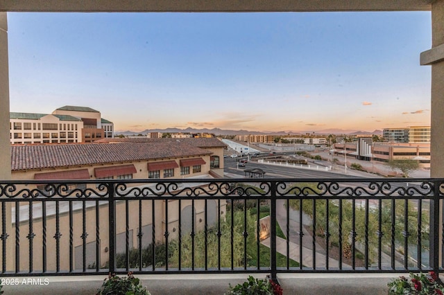 view of balcony at dusk