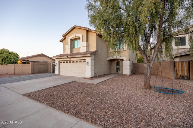 view of front of property featuring a garage