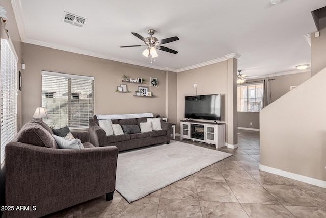 living room with tile patterned floors, ceiling fan, and crown molding