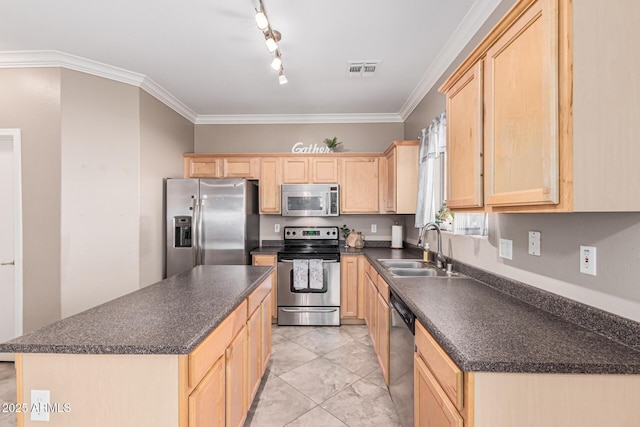 kitchen featuring stainless steel appliances, sink, a center island, light brown cabinets, and light tile patterned flooring