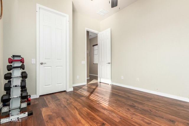 5607 W Alyssa Ln, Phoenix, AZ 85083 - unfurnished bedroom featuring dark wood finished floors and baseboards