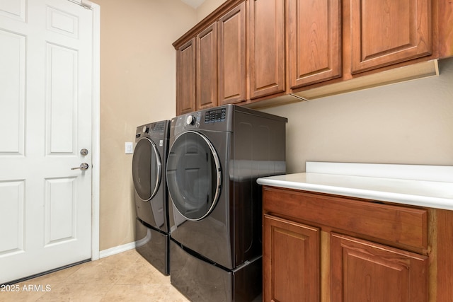 5607 W Alyssa Ln, Phoenix, AZ 85083 - laundry room featuring washer and dryer, cabinet space, and light tile patterned floors
