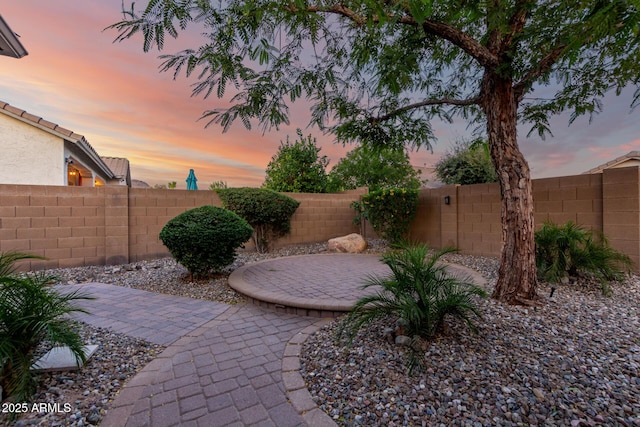 5607 W Alyssa Ln, Phoenix, AZ 85083 - patio terrace at dusk featuring a patio area and a fenced backyard