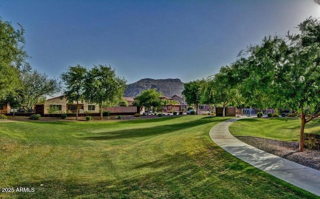 5607 W Alyssa Ln, Phoenix, AZ 85083 - surrounding community with a lawn and a mountain view