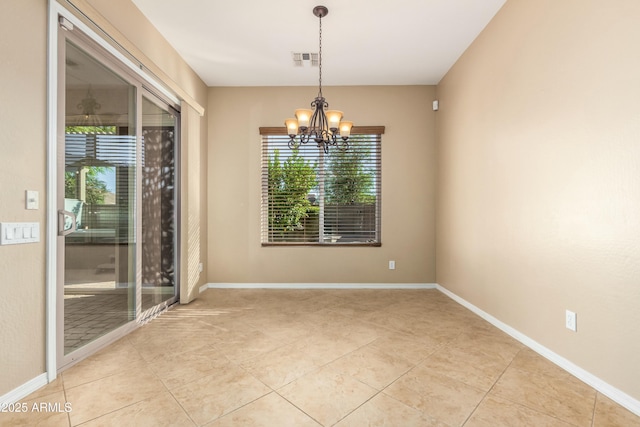 5607 W Alyssa Ln, Phoenix, AZ 85083 - empty room featuring plenty of natural light, a chandelier, and light tile patterned floors