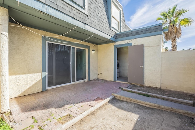 view of patio / terrace with fence