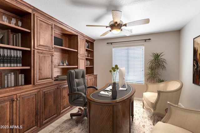 office space with ceiling fan