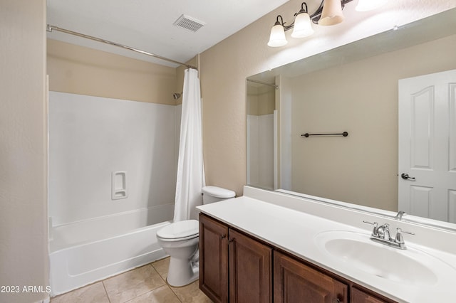 full bathroom with vanity, toilet, tile patterned floors, and shower / tub combo