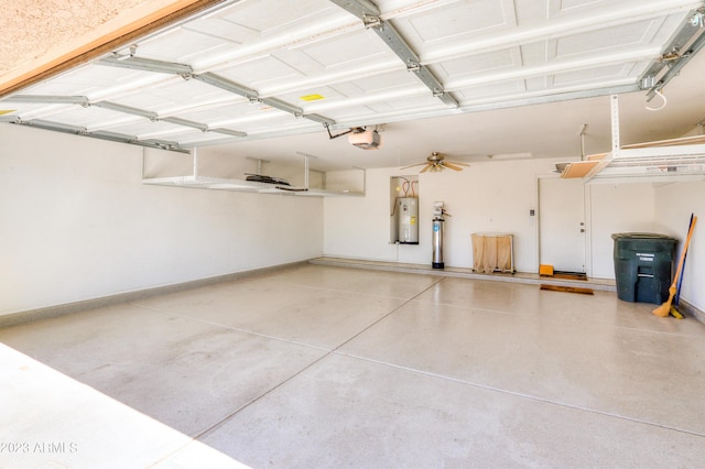 garage featuring electric water heater and a garage door opener