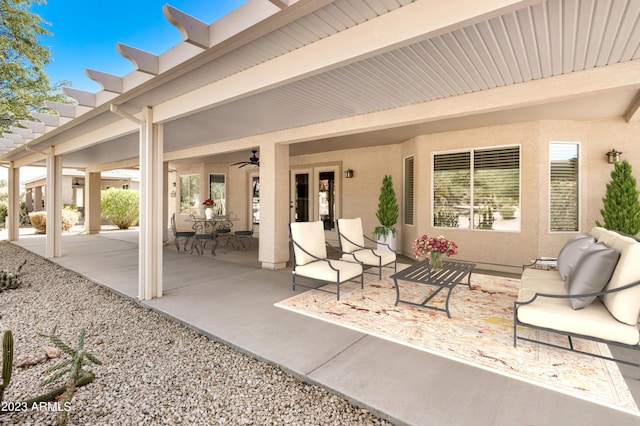 view of patio with ceiling fan