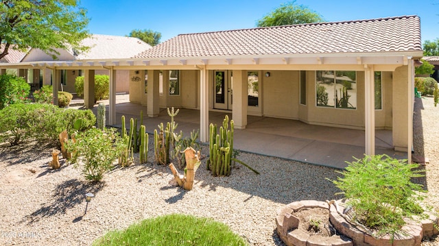 back of house featuring a patio area