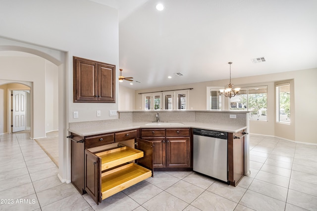 kitchen with decorative light fixtures, an inviting chandelier, sink, light tile patterned floors, and stainless steel dishwasher