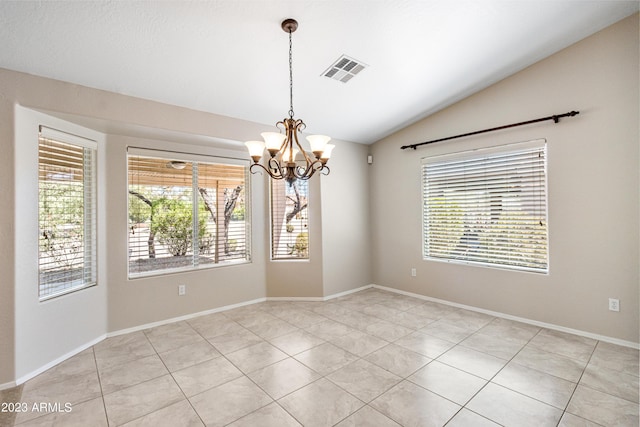 unfurnished room featuring vaulted ceiling, a chandelier, a healthy amount of sunlight, and light tile patterned floors