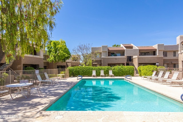 view of pool featuring a patio area